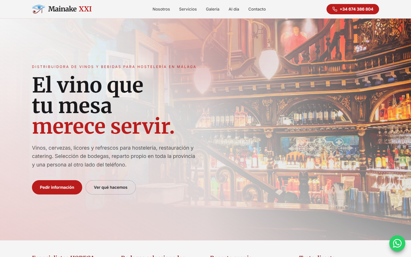 Portada de la web de Mainake XXI, con una barra de bar de fondo